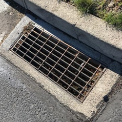 Strom drain on a city street.